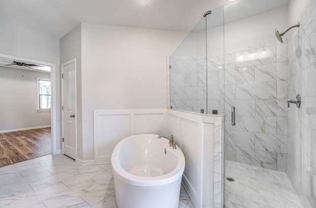 175 Valleyview Ln, Oakland, TN 38060 - full bath featuring ceiling fan, a freestanding tub, a stall shower, and marble finish floor