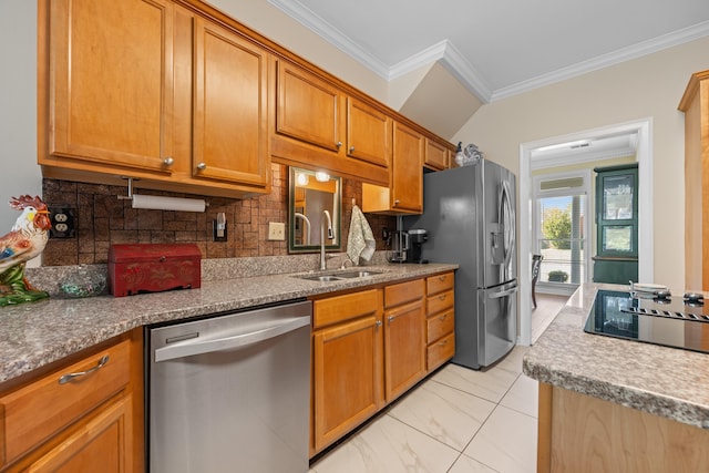 kitchen featuring backsplash, crown molding, brown cabinets, stainless steel appliances, and a sink