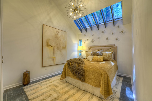 bedroom featuring an inviting chandelier and baseboards