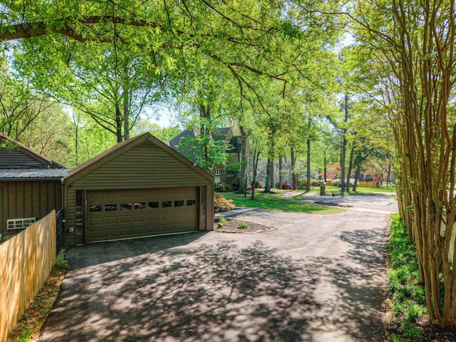 garage featuring fence
