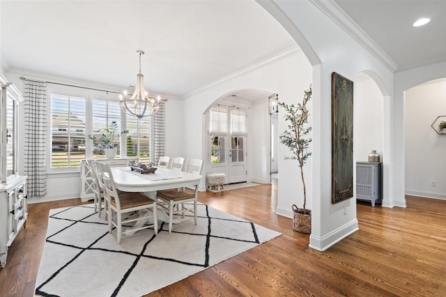 703 Justana Dr, Collierville, TN 38017 - dining area with a wealth of natural light, ornamental molding, an inviting chandelier, and baseboards