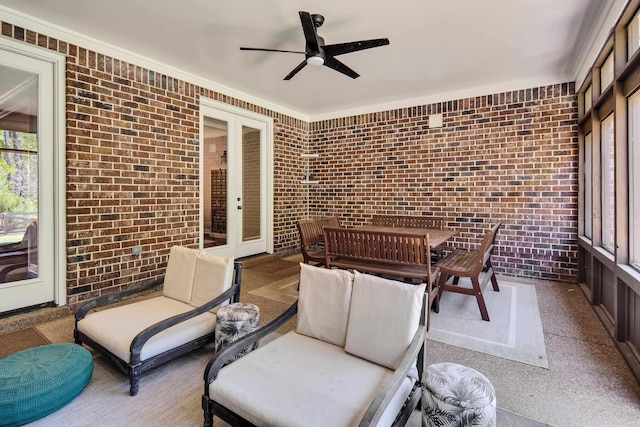 view of patio / terrace featuring an outdoor hangout area, a ceiling fan, and outdoor dining space