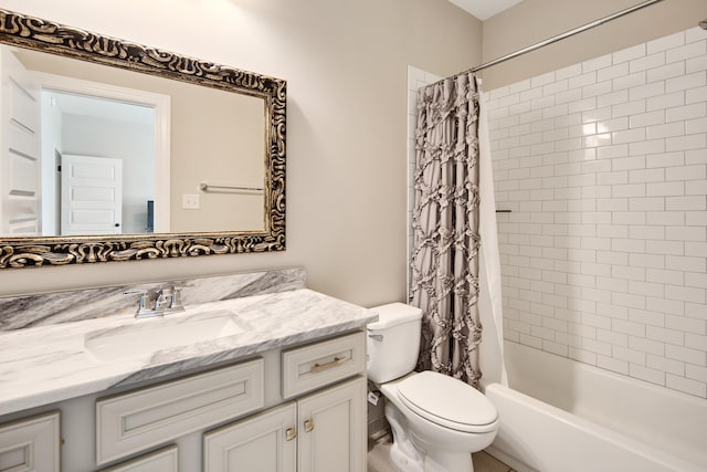 full bath featuring toilet, vanity, and shower / tub combo with curtain