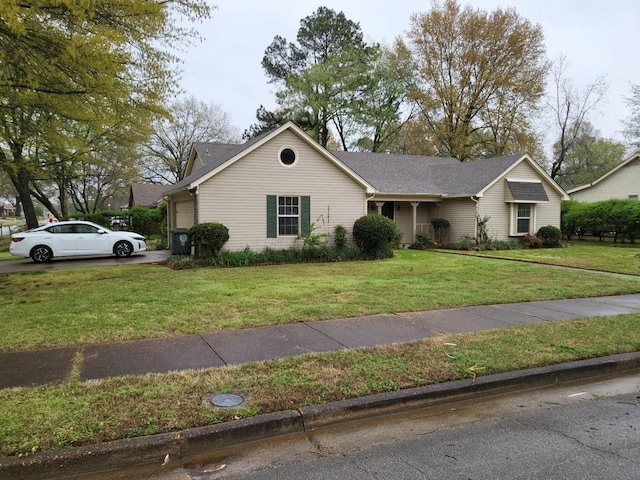 3786 Brandywine Cv, Memphis, TN 38115 - view of front facade with a front lawn and an attached garage