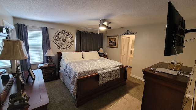 carpeted bedroom featuring a ceiling fan, visible vents, a textured ceiling, and a closet