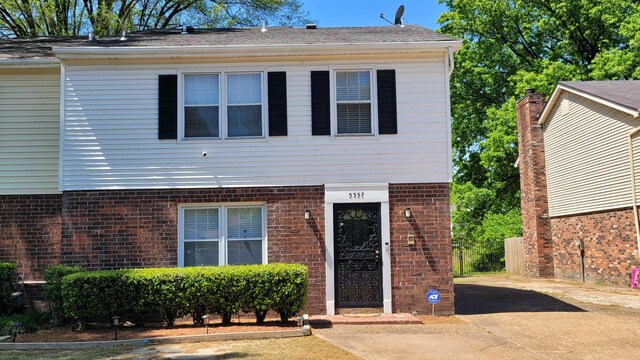 view of front of property with brick siding