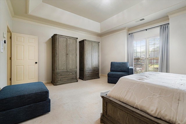 bedroom featuring light colored carpet, baseboards, visible vents, and a raised ceiling