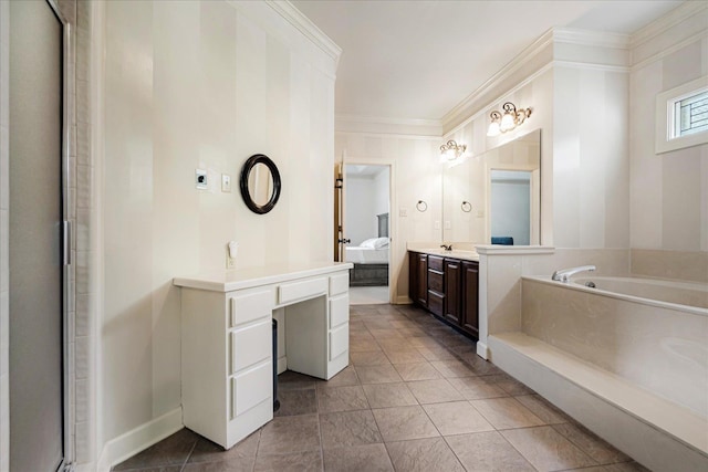 full bathroom with two vanities, a garden tub, crown molding, and baseboards