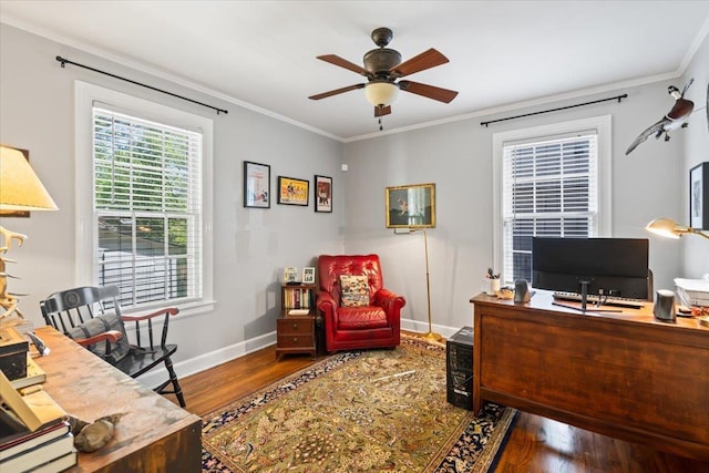 office area featuring crown molding, wood finished floors, a ceiling fan, and baseboards