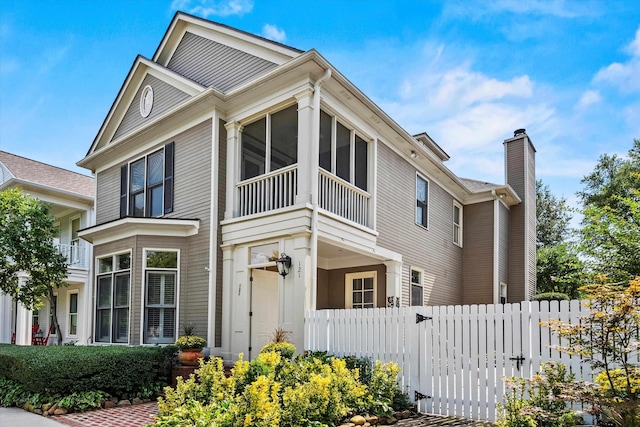 121 Harbor Town Blvd, Memphis, TN 38103 - exterior space featuring a chimney and fence