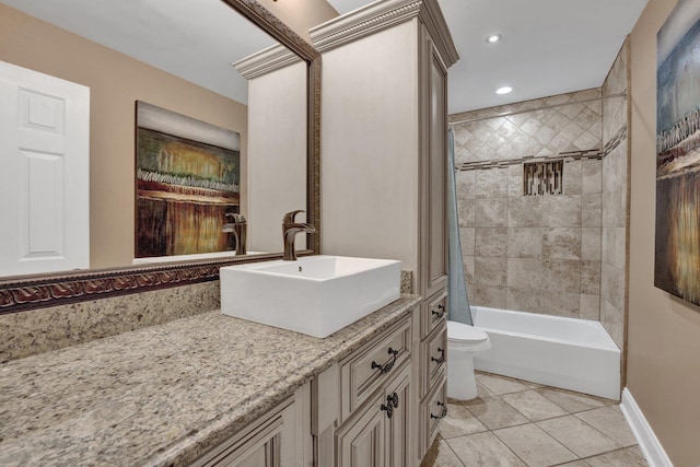 bathroom with vanity, baseboards, shower / tub combo, toilet, and tile patterned flooring