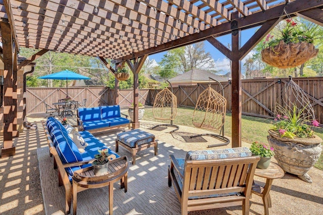 view of patio featuring a pergola, outdoor lounge area, and a fenced backyard