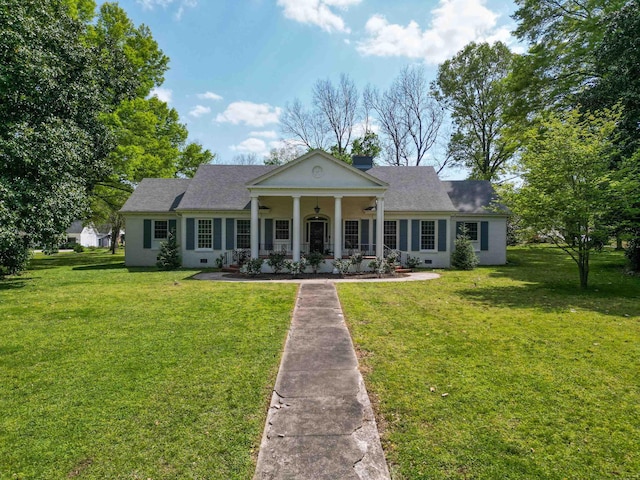 neoclassical / greek revival house with covered porch and a front yard