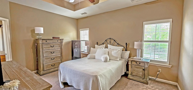 62 Mabel Ln, Atoka, TN 38004 - bedroom featuring light carpet, multiple windows, baseboards, and ceiling fan