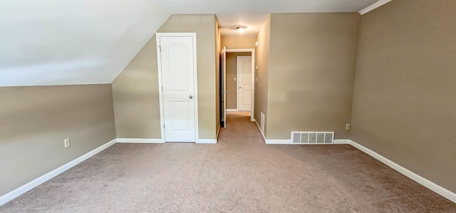 62 Mabel Ln, Atoka, TN 38004 - additional living space featuring carpet floors, vaulted ceiling, and baseboards