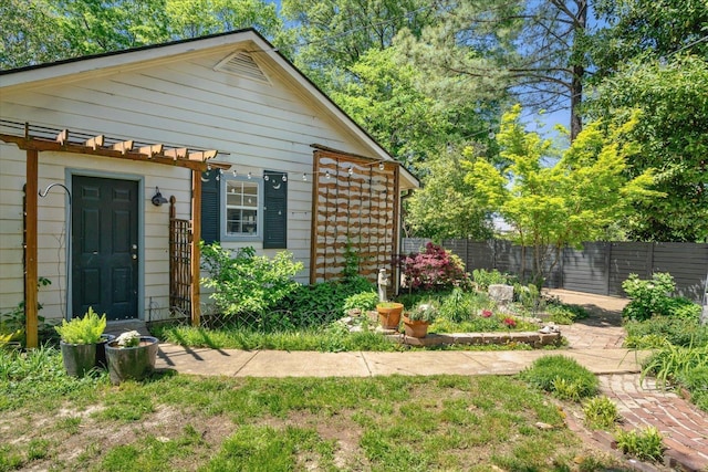 view of front of home with fence