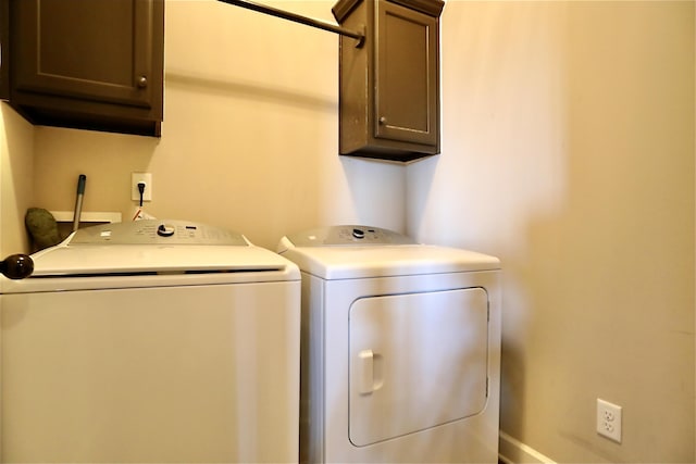 laundry area featuring cabinet space and washer and dryer
