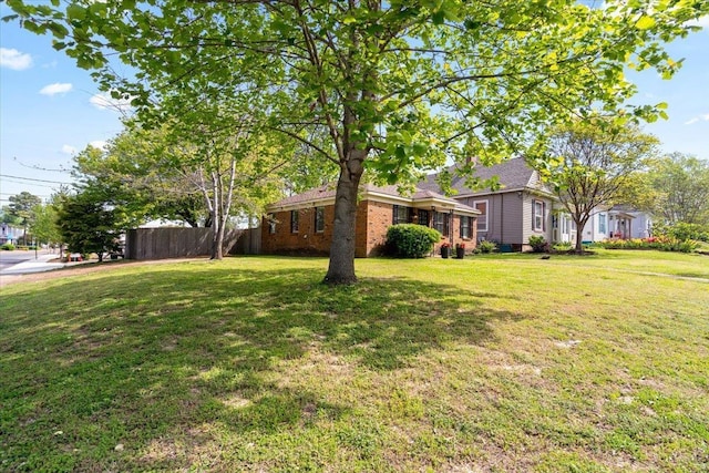 view of yard featuring fence