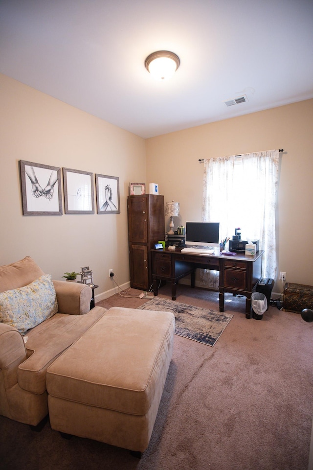office space featuring carpet floors and visible vents