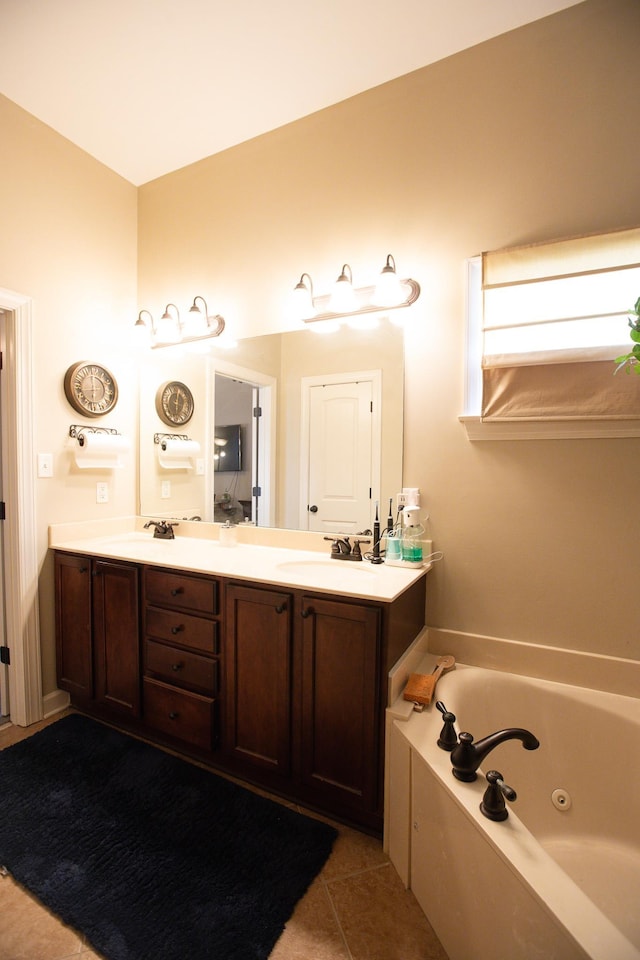 full bathroom with tile patterned floors, a sink, double vanity, and a jetted tub