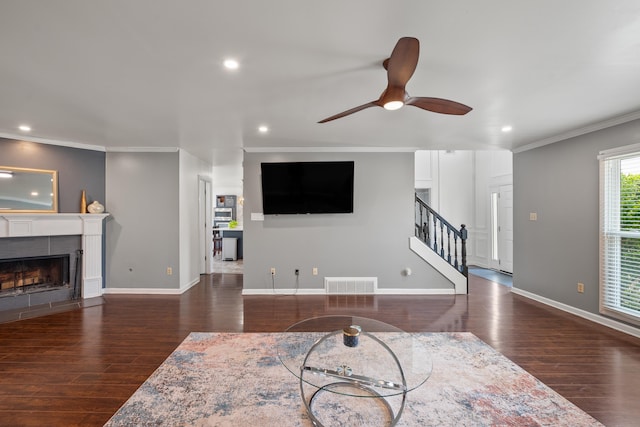 living area featuring stairway, wood finished floors, visible vents, and recessed lighting