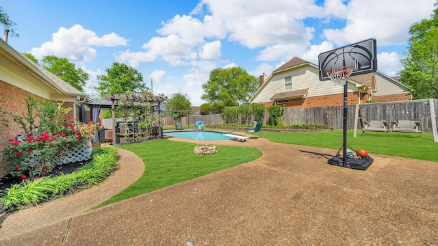 exterior space with a fenced backyard, a pergola, and a yard
