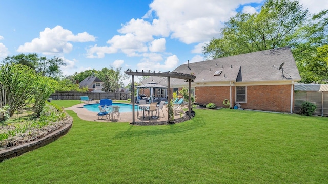 view of swimming pool featuring a pergola, a lawn, a fenced backyard, a patio, and a fenced in pool
