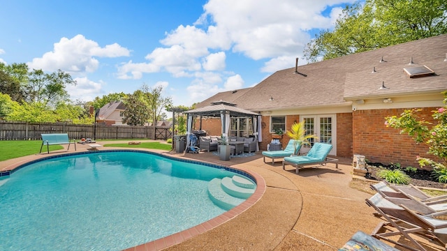 view of pool with a fenced in pool, outdoor lounge area, a fenced backyard, a patio, and a gazebo