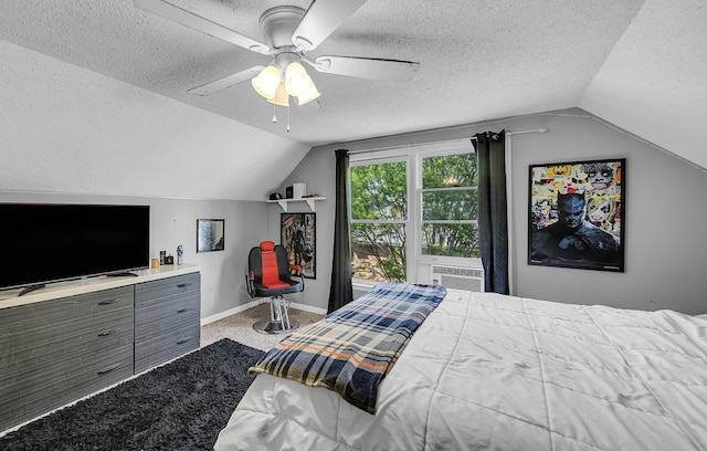 bedroom featuring vaulted ceiling, a textured ceiling, cooling unit, and ceiling fan