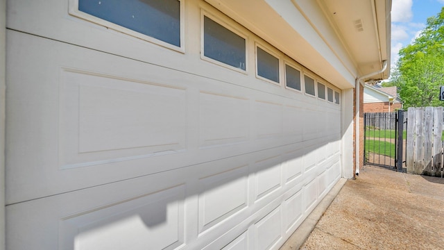 view of home's exterior featuring fence