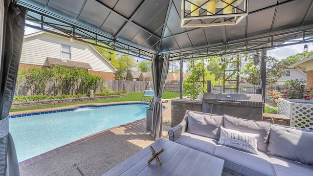 view of pool featuring a fenced in pool, a patio area, a fenced backyard, and an outdoor living space
