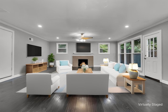 5188 Gwynne Rd, Memphis, TN 38117 - living area featuring recessed lighting, a fireplace with raised hearth, baseboards, and ornamental molding