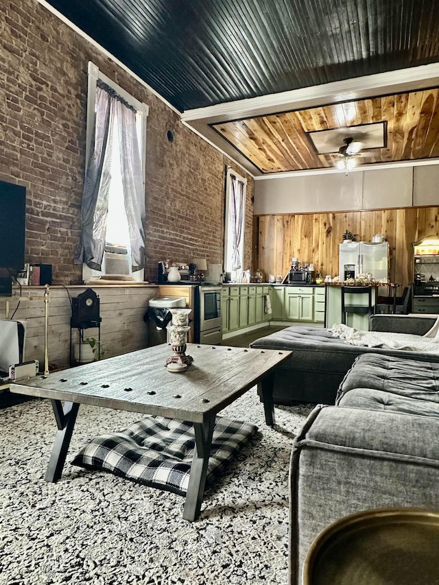 132 W Court Ave, Selmer, TN 38375 - living room with brick wall, wood walls, and wooden ceiling