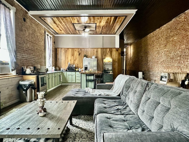 132 W Court Ave, Selmer, TN 38375 - interior space with brick wall, wooden ceiling, and a healthy amount of sunlight