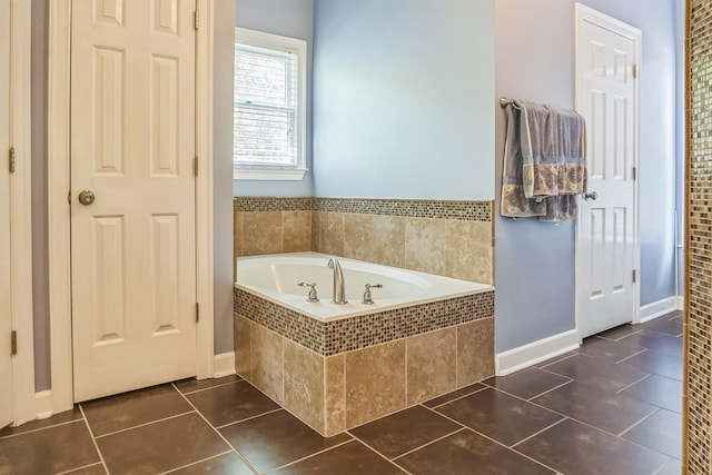 10290 W Shrewsbury Run, Collierville, TN 38017 - bathroom featuring a garden tub, baseboards, and tile patterned flooring