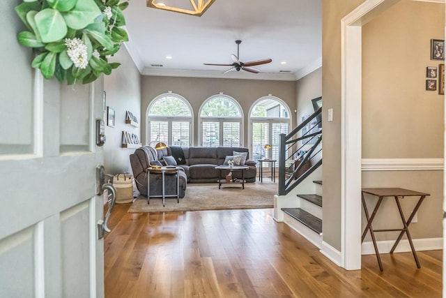 10290 W Shrewsbury Run, Collierville, TN 38017 - living area with wood finished floors, crown molding, and ceiling fan