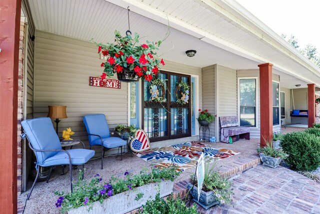 view of patio featuring a porch