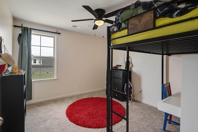 bedroom with baseboards, visible vents, and carpet flooring