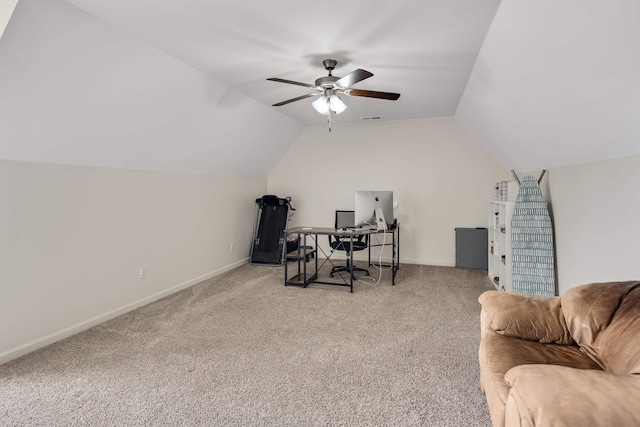 office area with a ceiling fan, carpet floors, baseboards, lofted ceiling, and visible vents