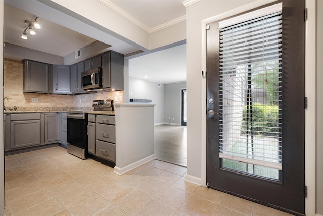 1832 Dragonfly Cv Unit 1, Germantown, TN 38138 - kitchen featuring tasteful backsplash, ornamental molding, appliances with stainless steel finishes, gray cabinets, and light tile patterned floors