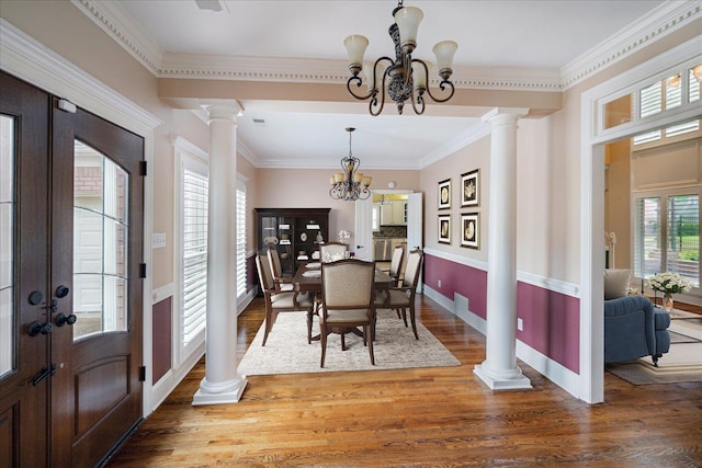 937 N Warwick Oaks Ln N, Collierville, TN 38017 - dining space with a notable chandelier, wood finished floors, french doors, and ornate columns