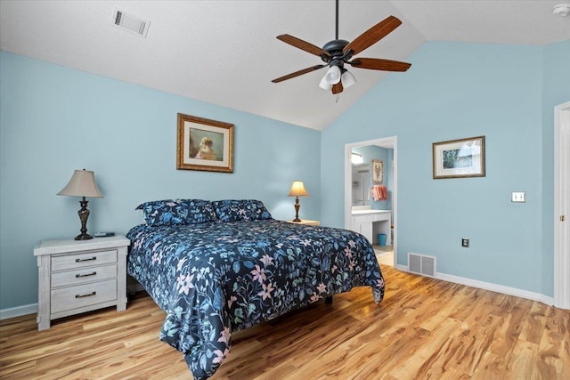bedroom with light wood-type flooring, baseboards, ensuite bath, and visible vents