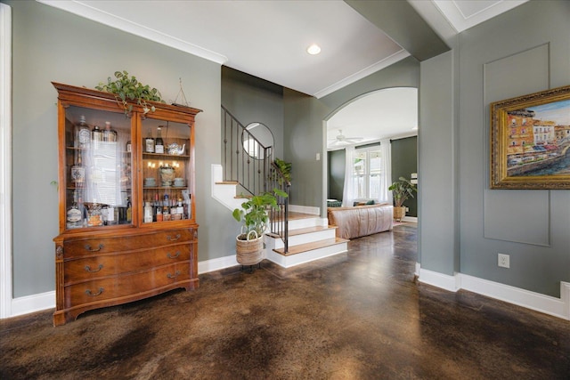 2363 Autumn Ave, Memphis, TN 38112 - entrance foyer with ceiling fan, baseboards, finished concrete floors, and stairway