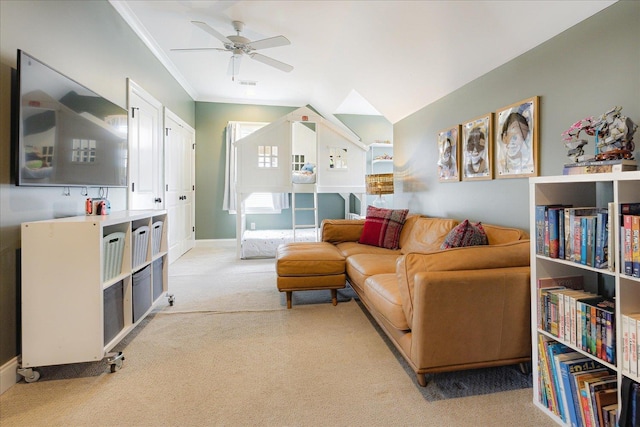 2363 Autumn Ave, Memphis, TN 38112 - living room featuring a ceiling fan, crown molding, light colored carpet, baseboards, and visible vents