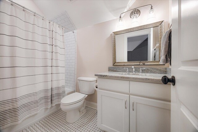 2363 Autumn Ave, Memphis, TN 38112 - full bath with shower / bath combination with curtain, vaulted ceiling, toilet, and vanity