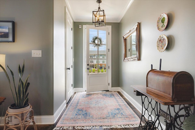 2363 Autumn Ave, Memphis, TN 38112 - doorway with baseboards, ornamental molding, and wood finished floors