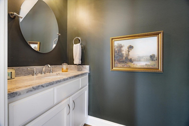 2363 Autumn Ave, Memphis, TN 38112 - bathroom featuring baseboards and vanity