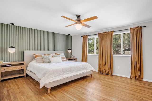 5657 Walnut Grove Rd, Memphis, TN 38120 - bedroom featuring light wood finished floors, baseboards, and ceiling fan