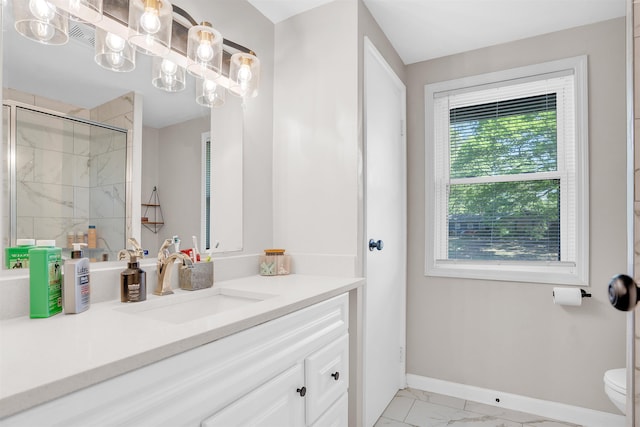 5657 Walnut Grove Rd, Memphis, TN 38120 - full bath with a shower stall, toilet, vanity, marble finish floor, and baseboards