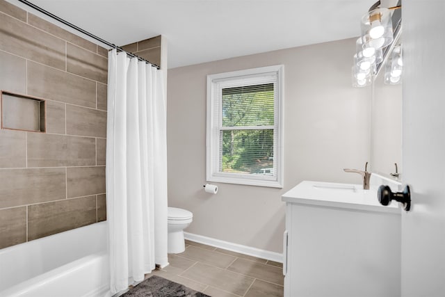 5657 Walnut Grove Rd, Memphis, TN 38120 - full bath featuring toilet, baseboards, shower / tub combo, tile patterned flooring, and vanity